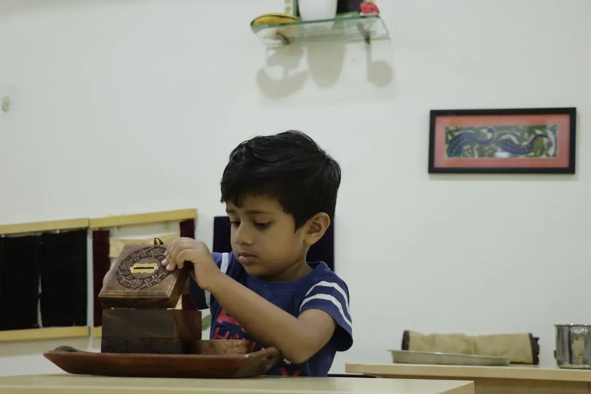 Toddler deeply focused on work