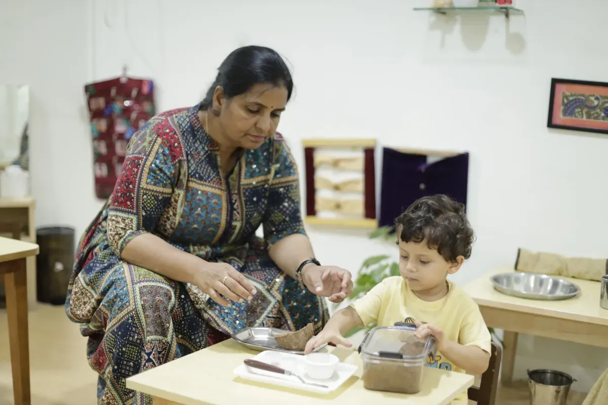 Happy toddler in Montessori class
