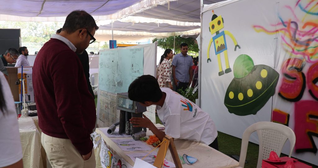 A child presenting their innovative project they built hands-on, illustrating project-based learning in a Montessori environment at Blue Blocks Montessori School.